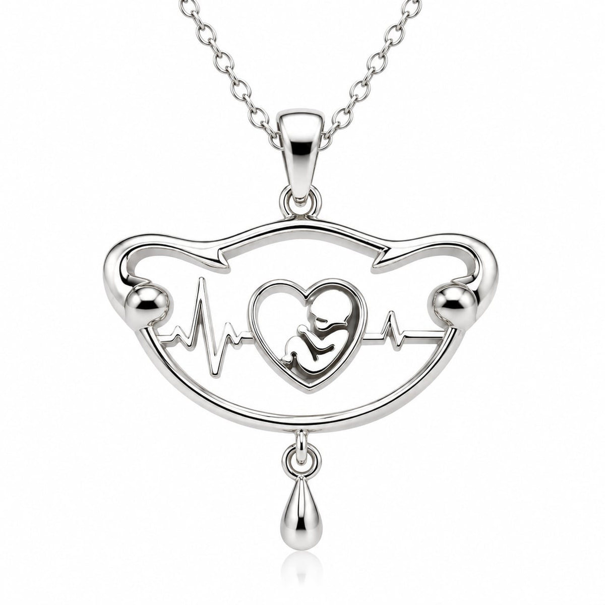 White gold version of The First Heartbeat pendant with baby and heartbeat detail